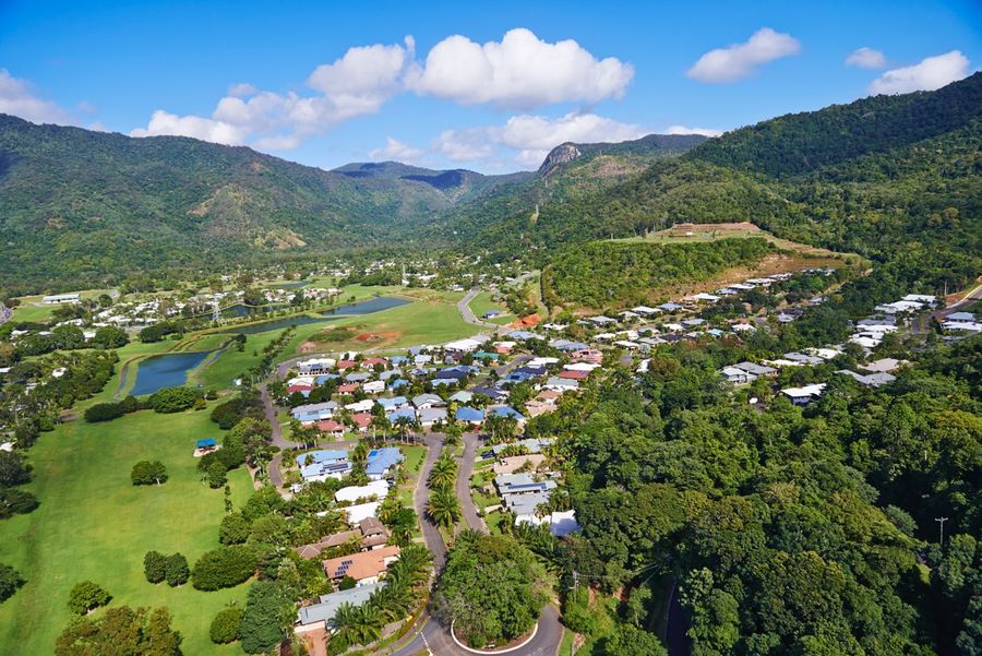 Red Peak Forest Estate looking south over the estate's lakes and streets toward the ranges